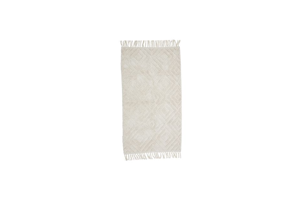 La alfombra Lenna de Bloomingville está fabricada en algodón 100% y presenta un bonito dibujo