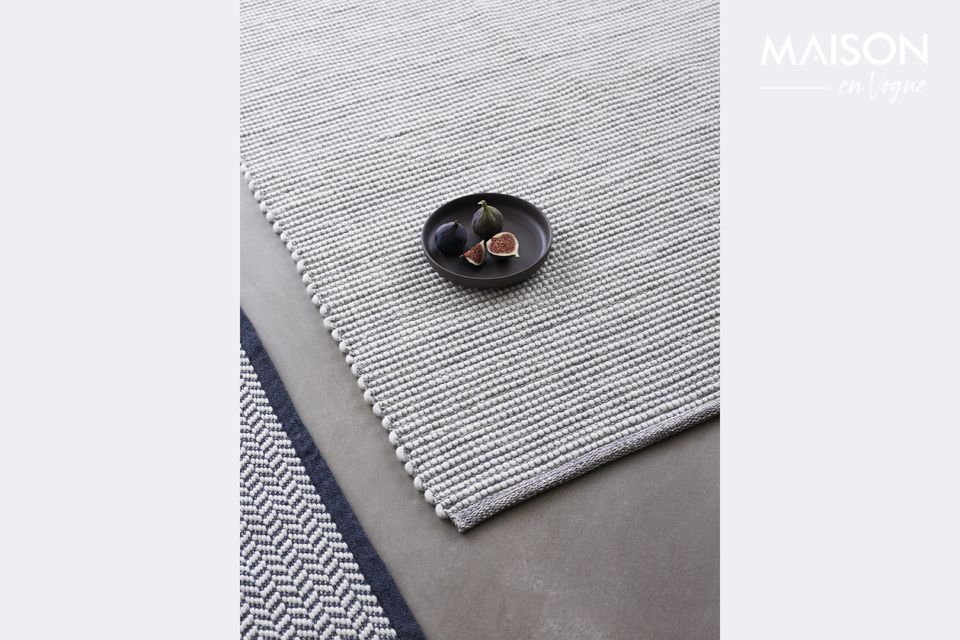 Una alfombra que ofrece un ambiente acogedor