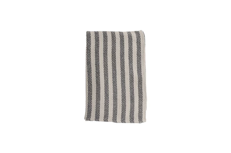 La colcha Kari de Bloomingville es una hermosa colcha hecha de grueso algodón reciclado