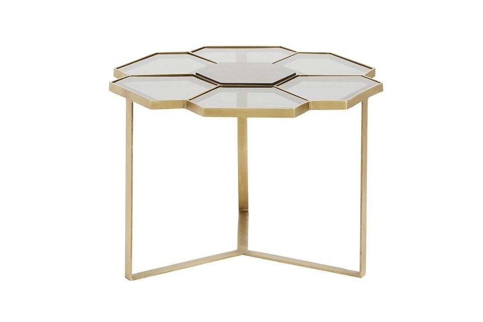 Descubra la variación dorada y negra de esta mesa de café de diseño