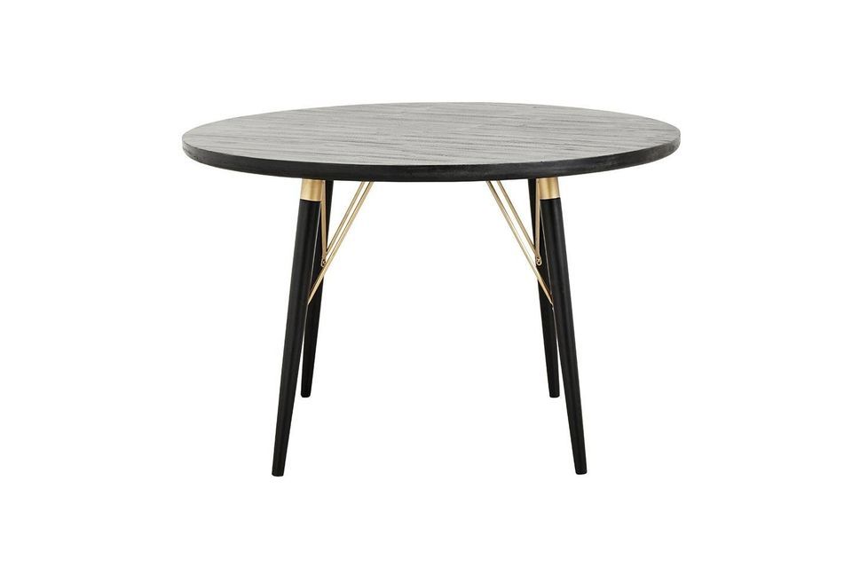 Esta mesa de comedor redonda está dotada de refinados detalles con patas en forma de huso