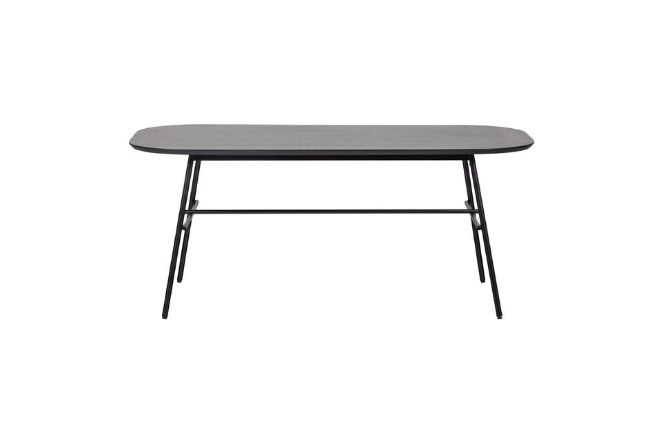 La mesa Elegance de madera de mango y metal negro hace honor a su nombre