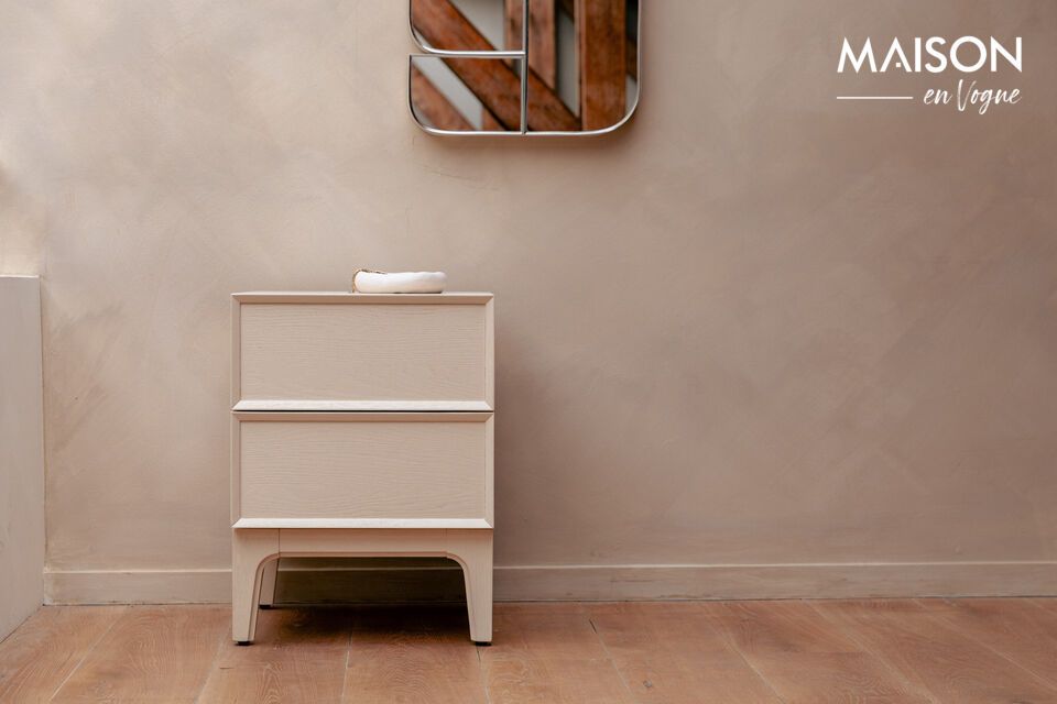 La mesilla de noche June de roble beige encarna la elegancia discreta a la vez que añade un toque