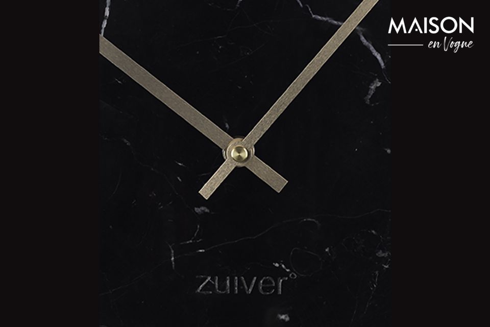 El Reloj Marble Time negro del tiempo es un elegante accesorio que realzará su interior