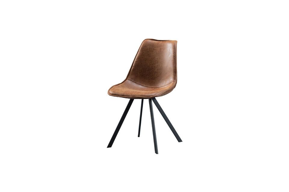 La silla de comedor Swen de la empresa holandesa WOOD destaca por su original forma y su cuero